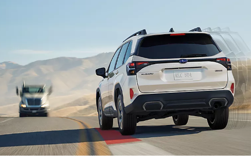 Subaru Hybrid SUV rear view on highway driving