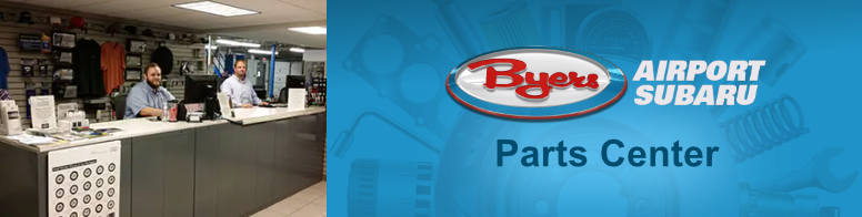Photo of two employees behind the counter of the Parts Center.