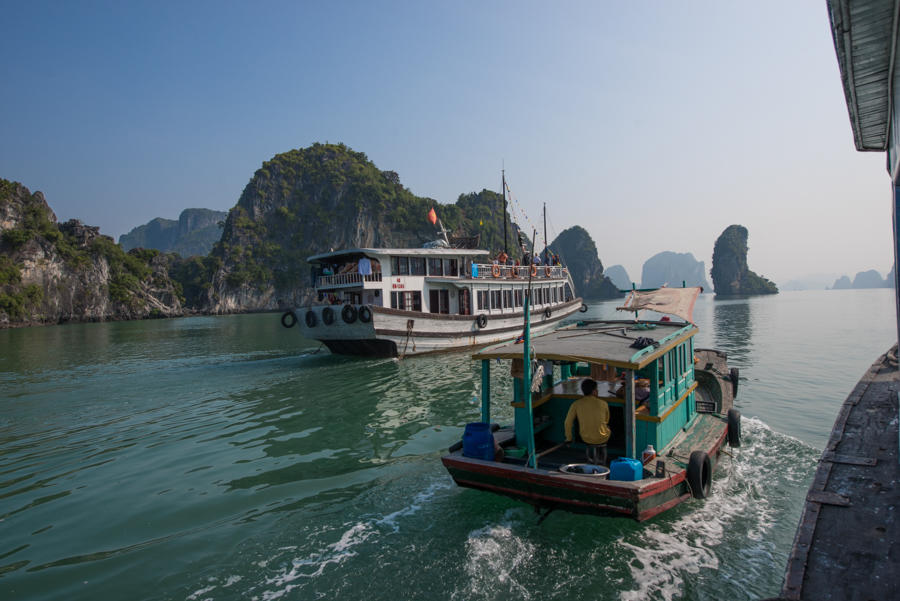 fruit vendors by boat, Halong Bay, Vietnam