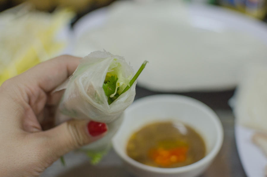 self serve Vietnamese spring rolls dipping in sauce, Con Market, Da Nang, Vietnam