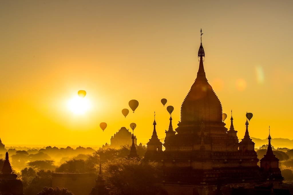 Hot air balloons over pagodas in Bagan, Myanmar