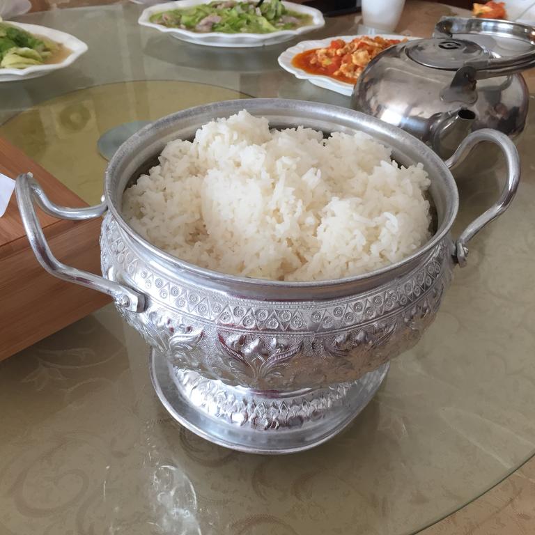 steamed rice in silver pot, Laos