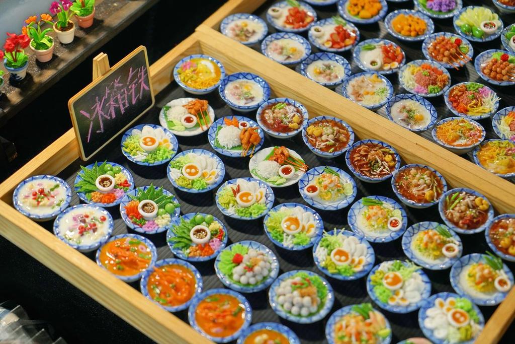 Fridge magnets that are shaped like Thai dishes, Sunday Market, Chiang Mai, Thailand