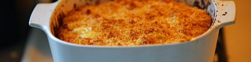a casserole dish sitting on a stove top