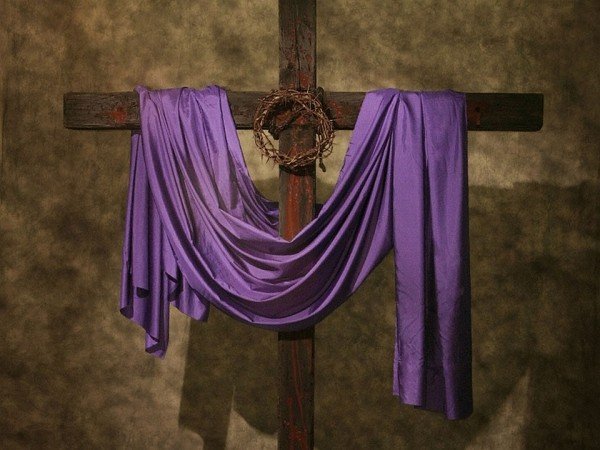 Cross draped with purple cloth
