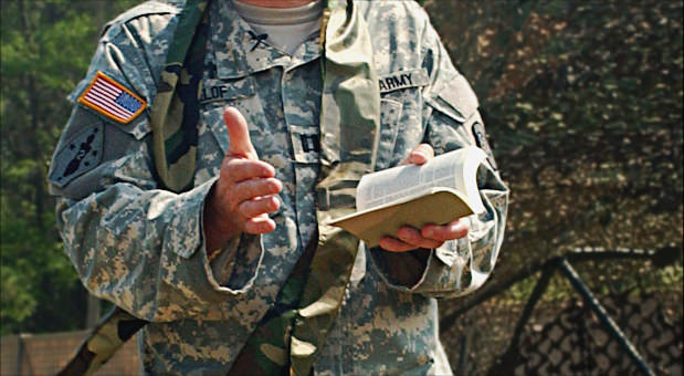 Army Chaplain with Bible.
