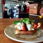 How does this sound for breakfast? Poached eggs, with tomato and hummus on sourdough 