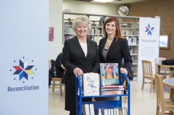 SPL director and CEO Carol Cooley and SPL board chair Candice Grant in the Reconciliation Reading area Photo credit: David Stobbe / stobbephoto.ca