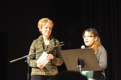 Mentor and mentee reading poem