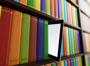 tablet on bookshelf