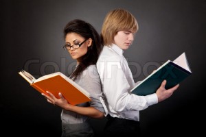 Two students are reading books