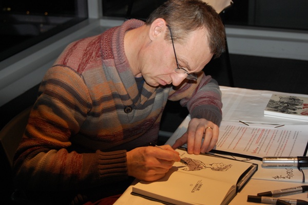 Graphic novel artist Caryl Strzelecki signing The War Within These Walls