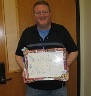 David Foster with dry-erase board.