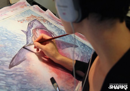 Roy in her studio in New York City, completing the cover for Neighborhood Sharks. Photo credit: Tim Stout.