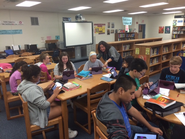 Students at Seneca Ridge Middle School (LCPS) work with librarian Lauren McBride to store and access information in the cloud. Photo credit: Lauren McBride 