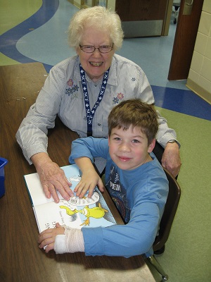 Bev Casperson and first grader Isaac Briggs.