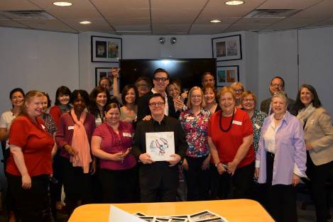 Nathan Lane and Devlin Elliott pose with librarians.