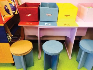 Student-built stools and book bins.