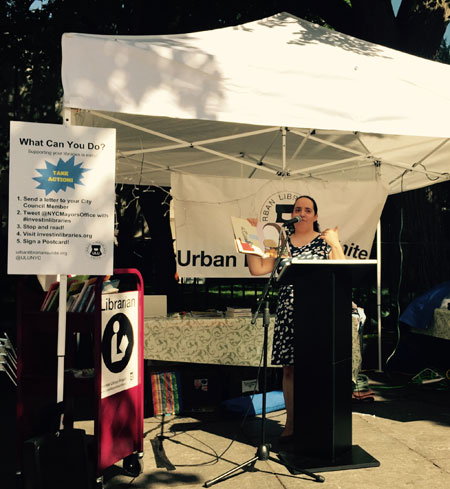 Senior editor of reviews, Shelley Diaz, reading Lane Smith's It's a Book (Roaring Brook, 2010).