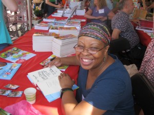 Author Rita Williams-Garcia signing copies for fans at the Princeton Book Festival.
