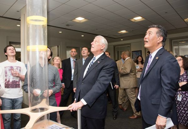 Congressman Mark Takano, Co-chair of the Congressional Maker Caucus, and Democratic Whip Steny Hoyer enjoy the Museum of Science, Boston’s “Soaring Satellites” activity, a hands-on engineering activity for families. Photo by Earl Zubkoff.