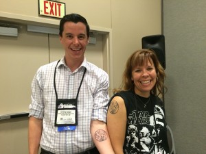 LJ Movers & Shakers and Dr. Who fans Matthew Winner and Sherry Gick show of their freshly inked tattoos, which say "Mover and Shaker" in Gallifreyean.