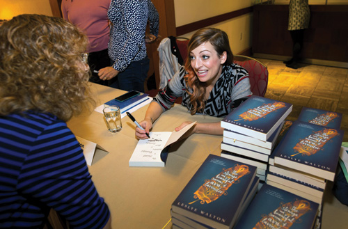 ; author Leslye Walton greets attendees at the book signing.