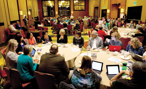 Group work at the Saturday breakfast hackathon.
