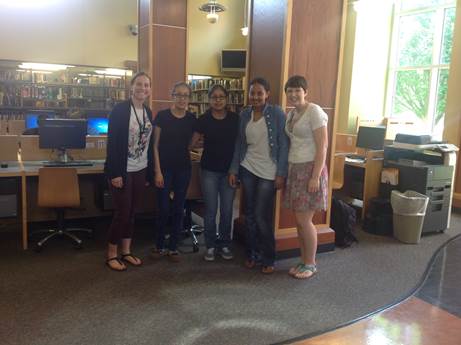 Sara Frey, right, and ELL teacher Charise Young flank three ELL students