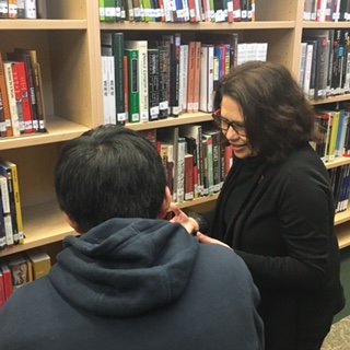 Kathy Clarke works with one of her ELL students.