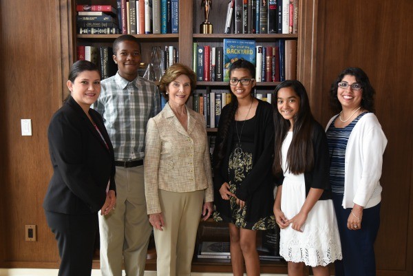 Mrs. Bush with students from the Dallas Environmental Science Academy, as well as librarian, Tabatha Sustaita-Robb and principal Diana Nunez, during the “Our Great Big Backyard” book event at the George W. Bush Presidential Center. Photo by Grant Miller