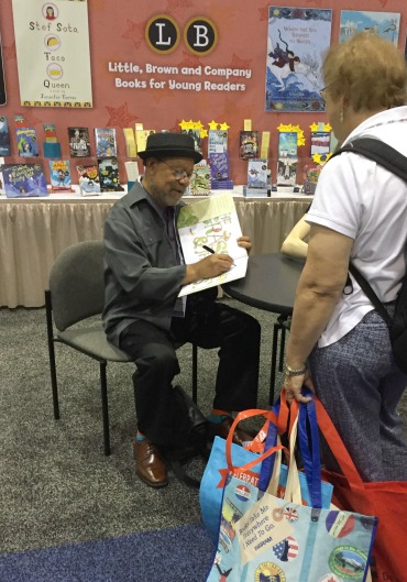 Jerry Pinkney was all smiles at the Little, Brown booth.