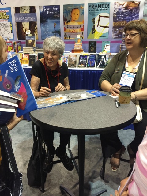 Lois Ehlert was indefatigable, signing copy after copy of Rain Fish at the S&S booth