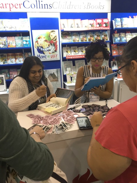 Sona Charaipotra (left) and Dhonielle Clayton (right) at the HarperCollins booth