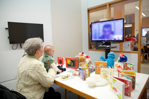 A family visit. Photo courtesy of Brooklyn Public Library
