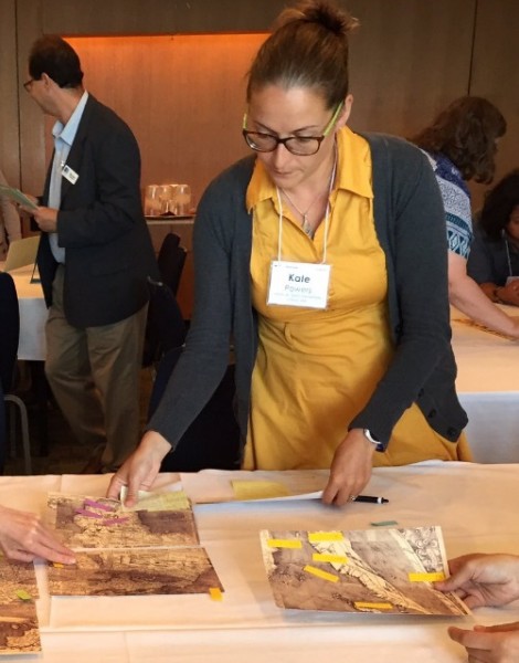 Powers examining an early European map. Each participant was assigned an individual primary source, before combining their findings as a group. 