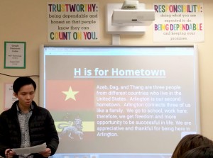 An Arlington student gives a presentation on what "home" means to him.