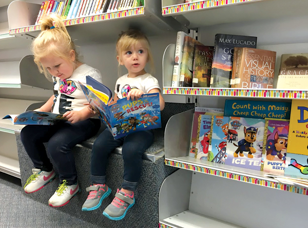 Young patrons perch inside the Twinsburg (OH) Public Library vehicle, purchased second hand