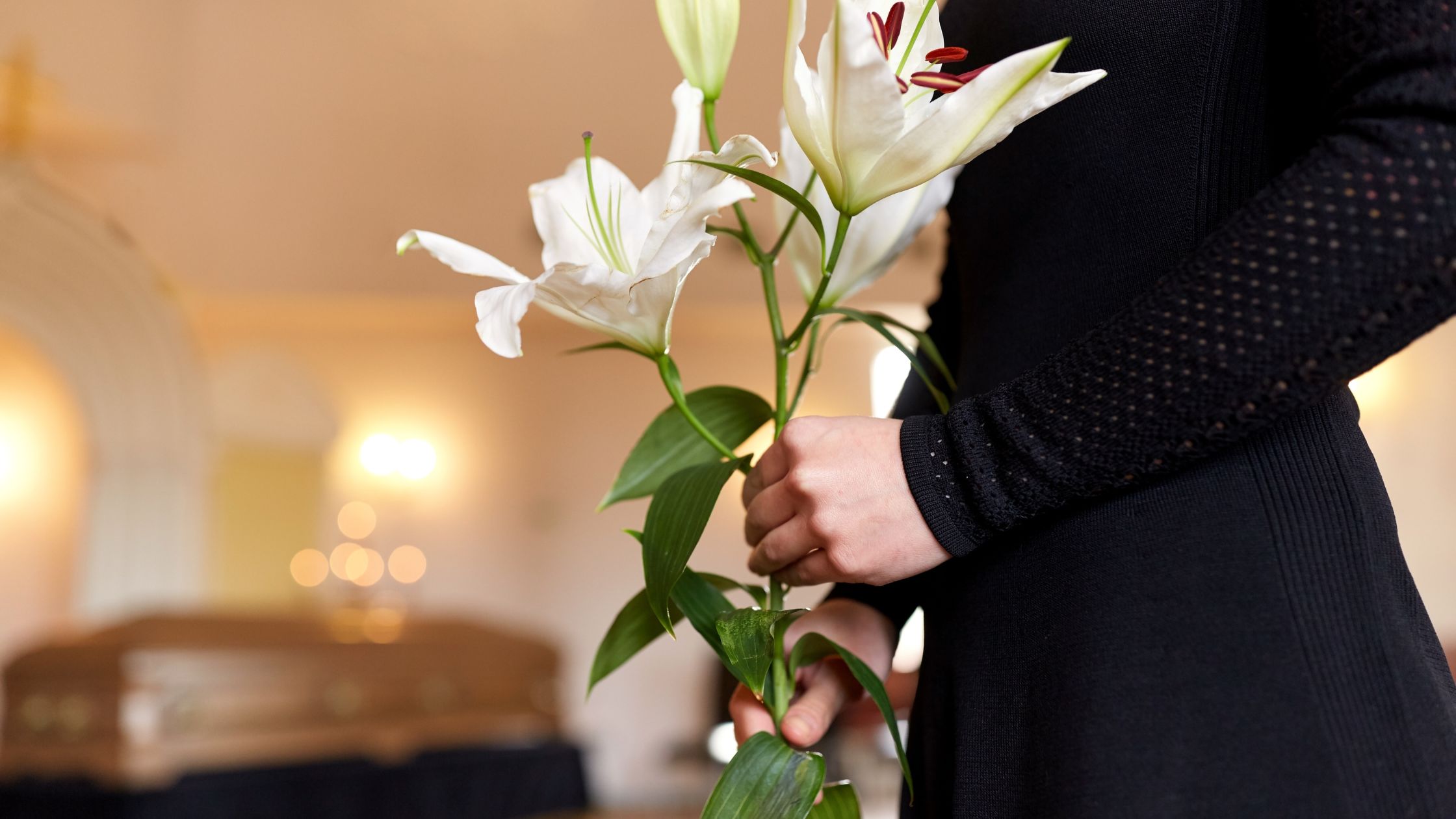 Woman holding a lily