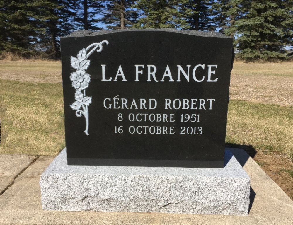Monuments Adam's Funeral Home Notre Dame de Lourdes MB funeral home