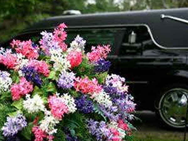 a hearse used to transport caskets at the funeral service