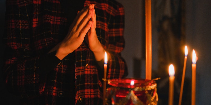 prayer candles at a funeral service in Manville, RI
