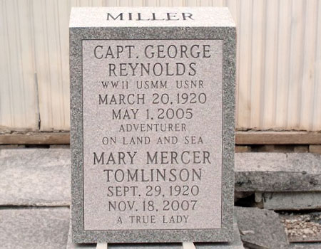 This is an upright custom stone in Barre Gray granite from Vermont with the couples&rsquo; life experiences.