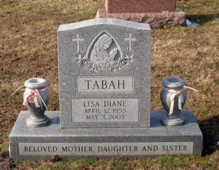 This is an individual stone in Barre Gray granite from Vermont. Note the carving of the Virgin Mary.