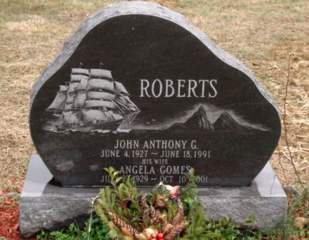 This is an upright custom stone in Gem Mist granite from Pennsylvania with &ldquo;etched&rdquo; drawings.