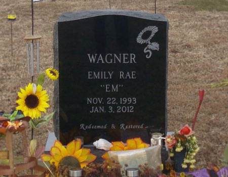 This is an upright individual stone in Jet Black granite from South Africa with a family design.