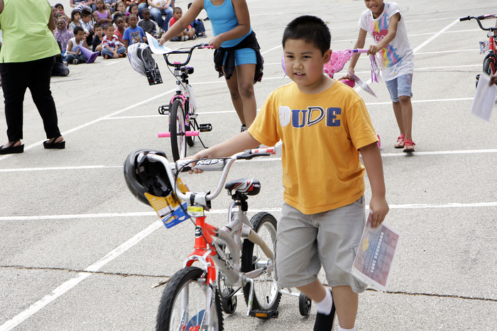 Thatcher's Funeral Home Celebrates Community with Grant Elementary School Bike Giveaway 2013