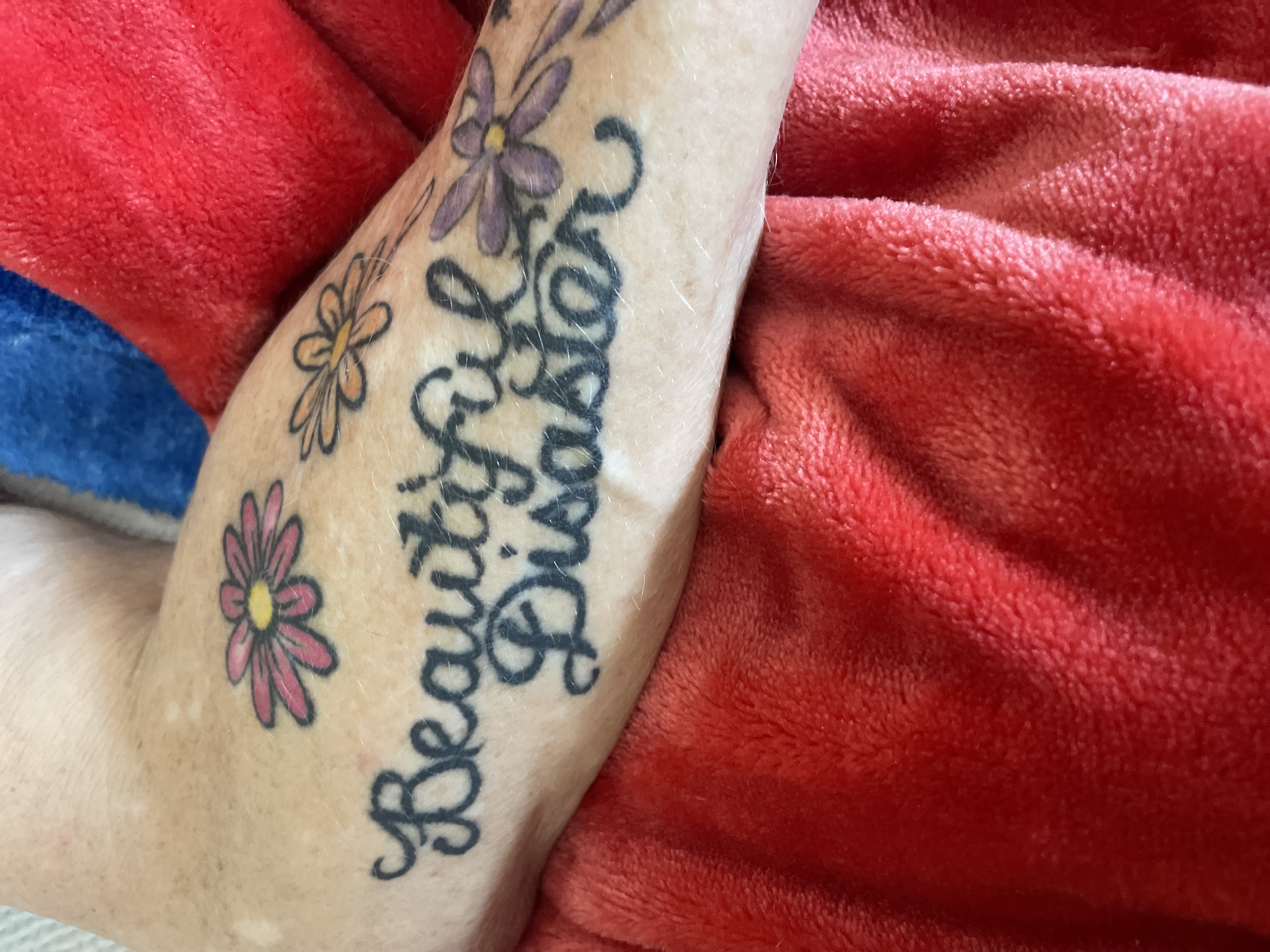 Beautiful Disaster Wrist Tattoo