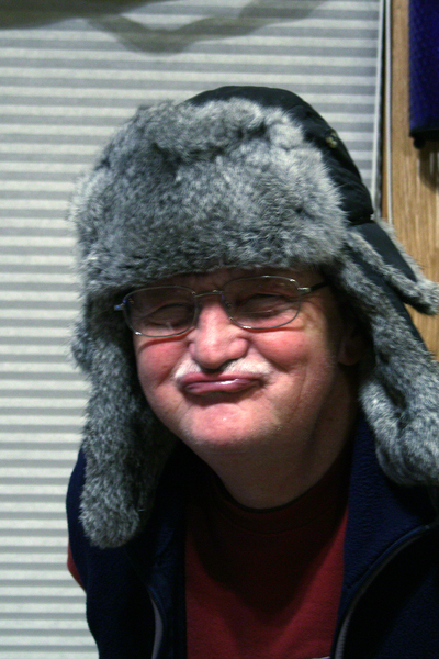 Grandpa in goofy fashion. He prepared for this photo by removing his dentures. Definitely an improved expression. Christmas 2006.