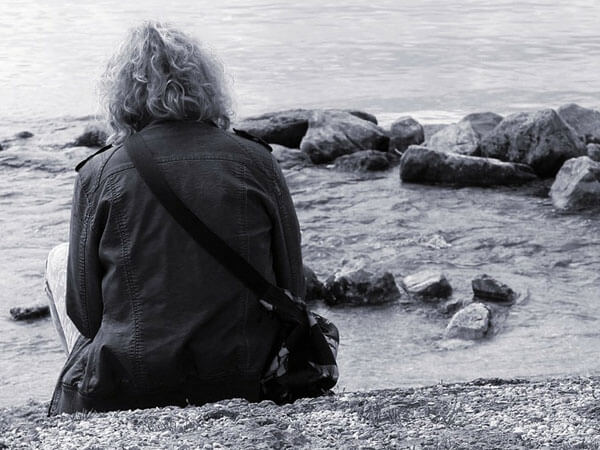 Grieving Old Man Staring at the Sea